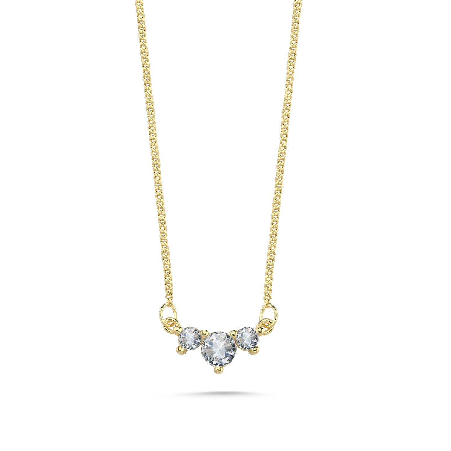 Dainty 3 stone cz necklace in 14k yellow gold on a clean white background.