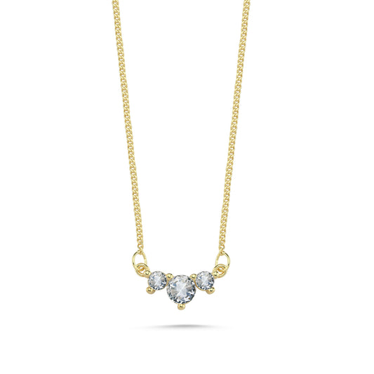 Dainty 3 stone cz necklace in 14k yellow gold on a clean white background.