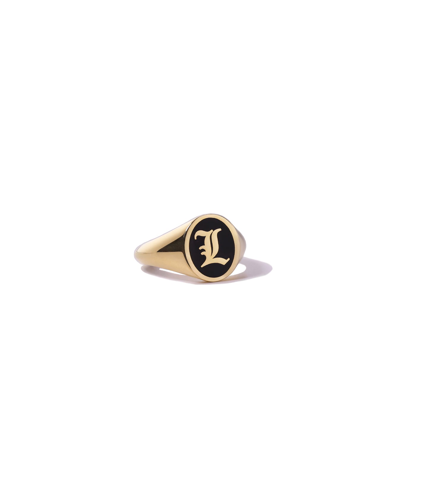 personalized gold initial ring with black enamel.
