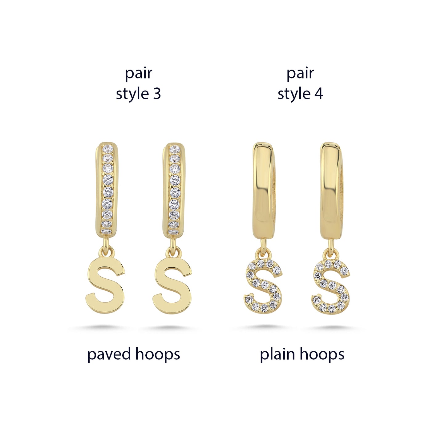 Gold letter huggie hoop earrings set on a white background