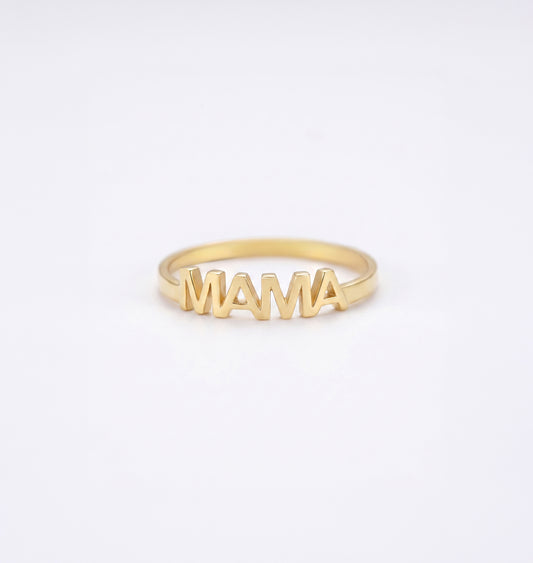 Gold MAMA' ring on a white background