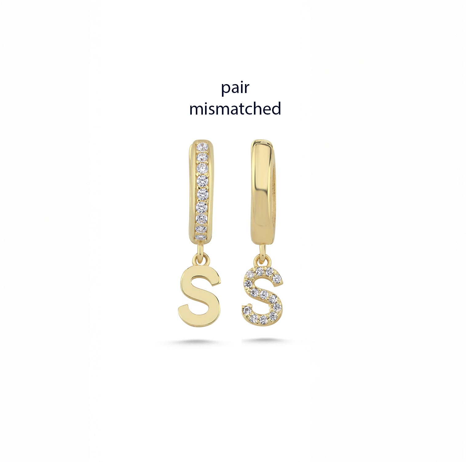 pair of dainty gold initial earrings