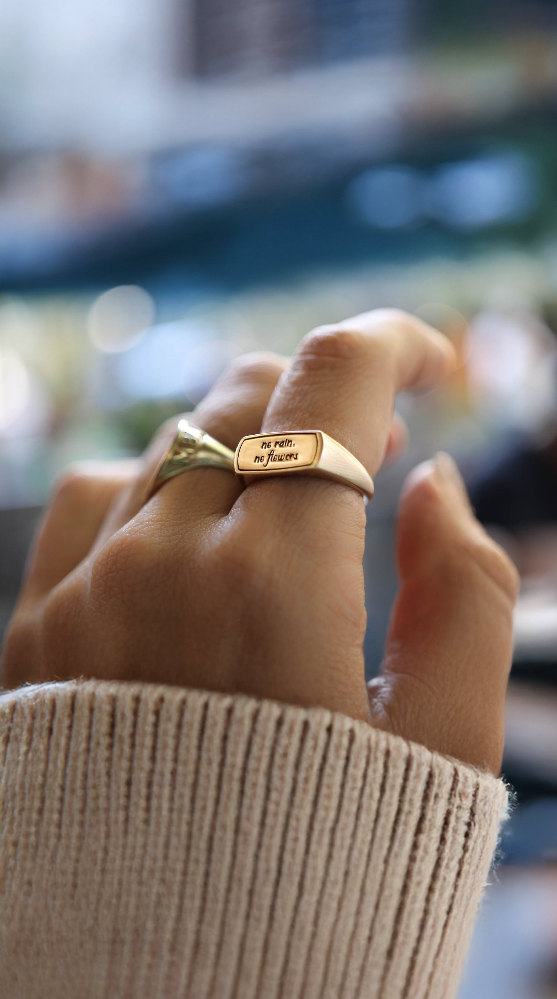 Personalized signet ring for women stacked with a an oval signet.