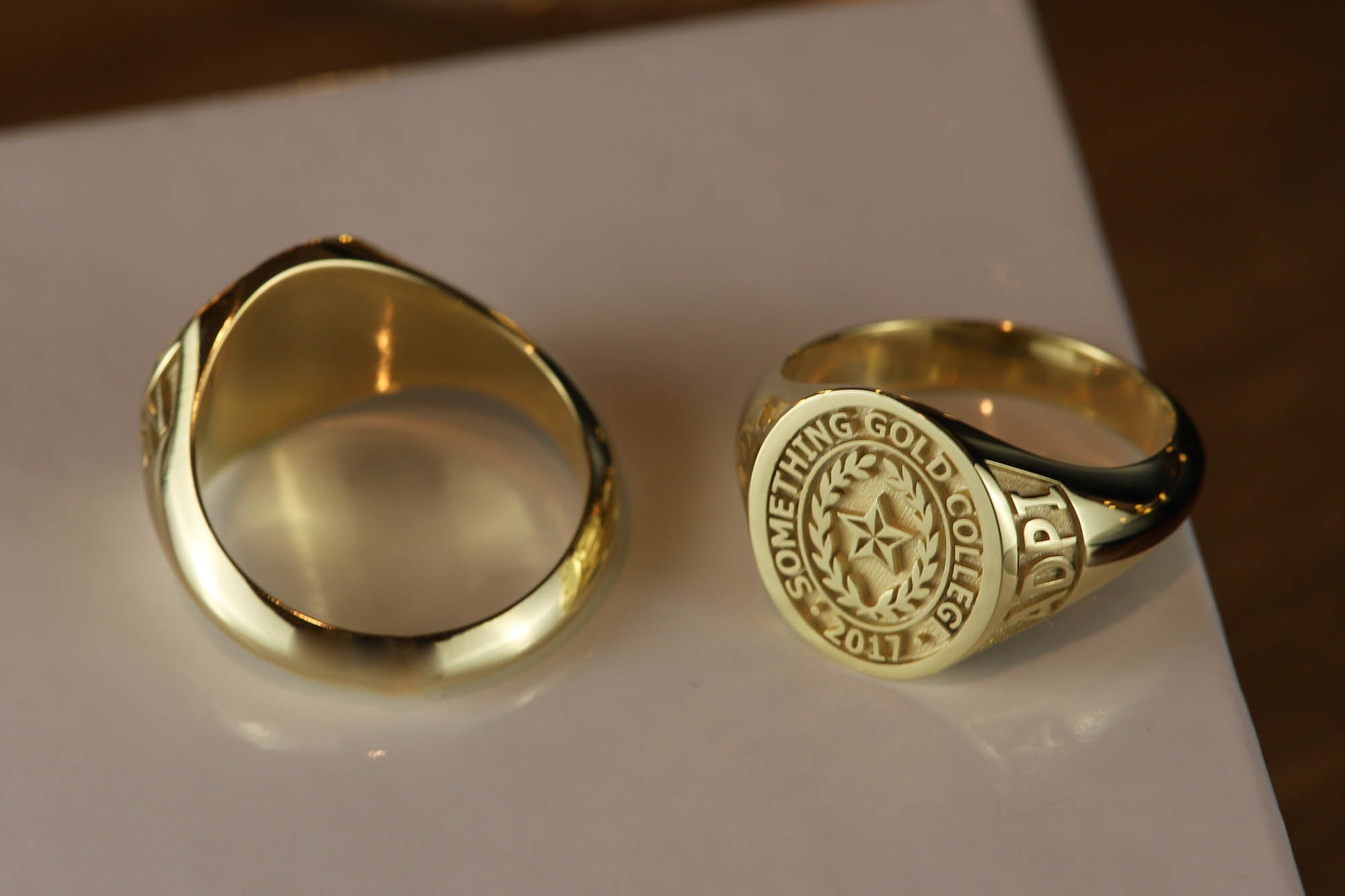 Mens gold college hot sale rings for sale