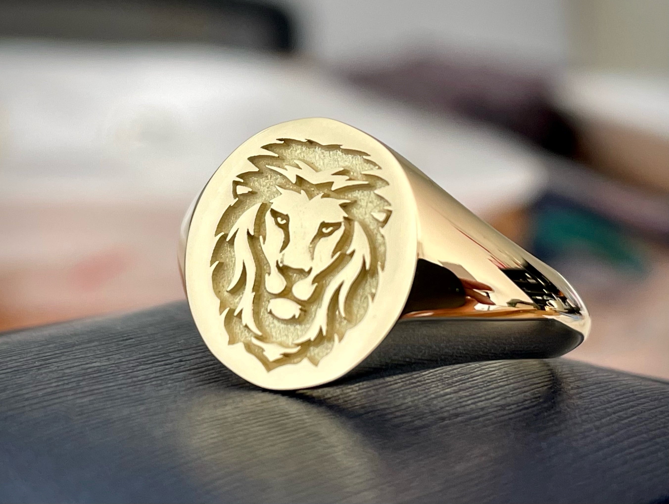 Ring with store lion head